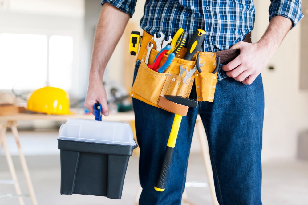 Handyman having all his tools and tool box with him