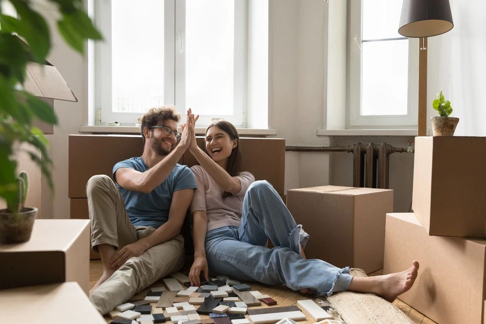 Happy Young Couple Renovating Home