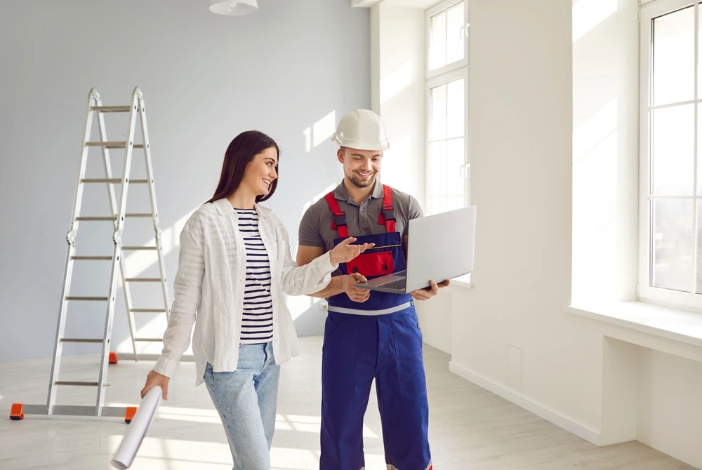 Home Renovation Contractor with lady owner
