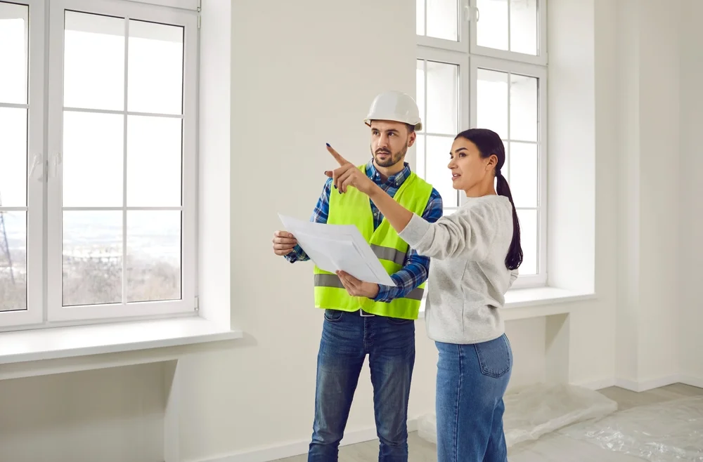 Professional Builder with home owner lady