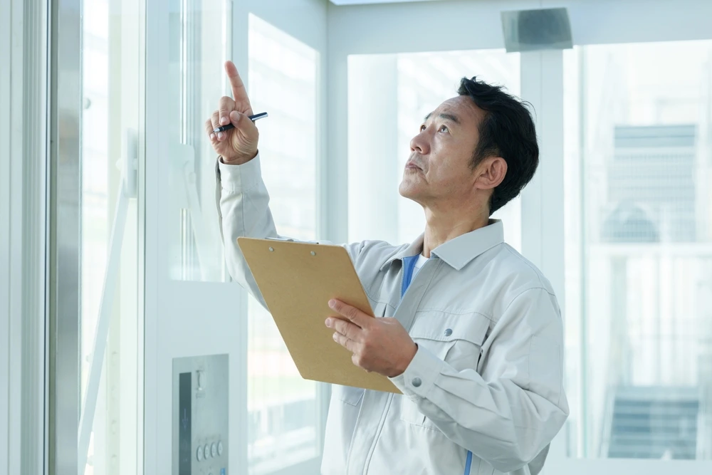 office maintainance expert making inspection